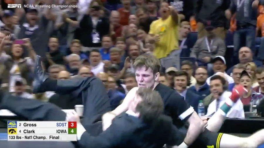 Wrestler Celebrates Title By Throwing Coach Down On The Mat