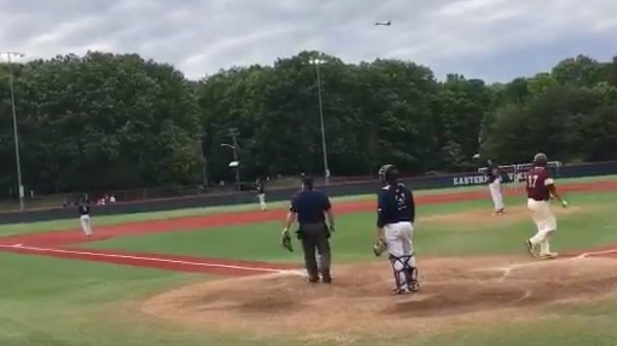 High School Baseball Player Achieves Impressive Height On Bat Flip