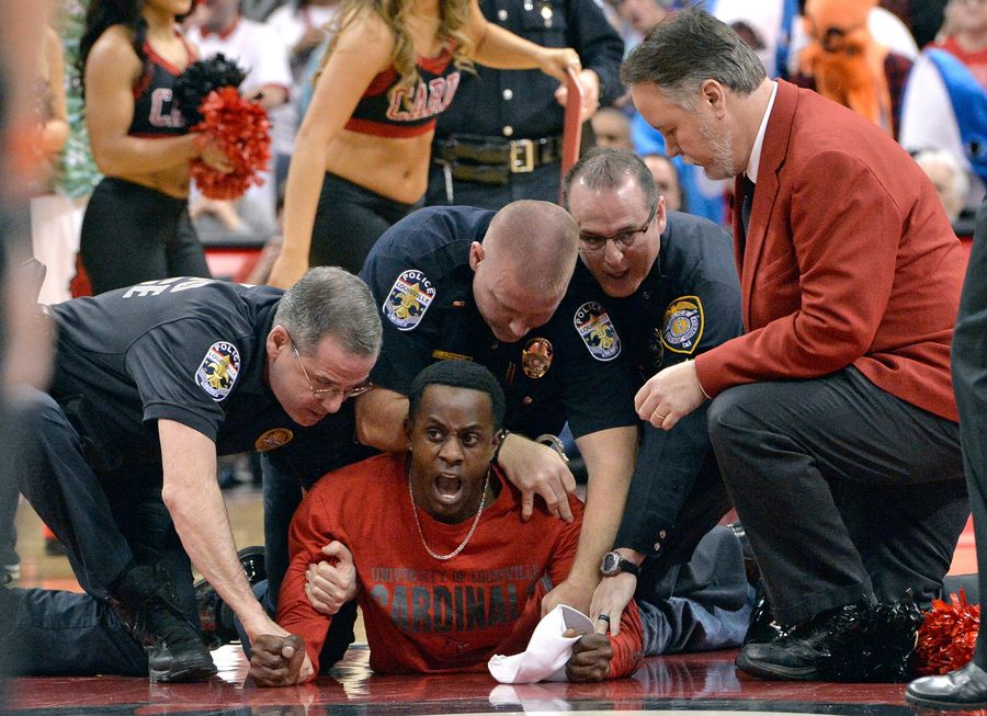 Idiot On The Court Gets Arrested Trying To Join Miami Huddle