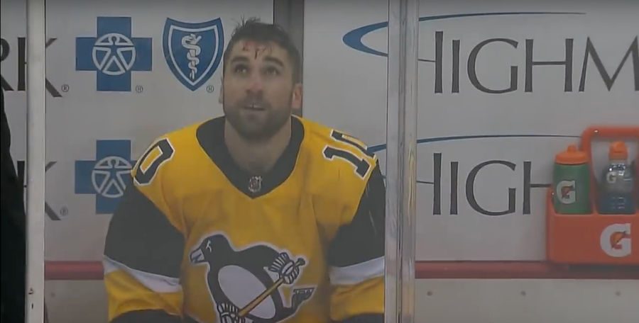 Garrett Wilson Got DDT-ed Into The Ice And Picked Up A Nasty Gash