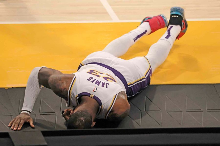 Report: LeBron James out indefinitely with high ankle sprain