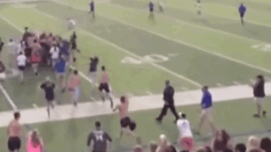 Cop Trips High School Kids Rushing Field To Celebrate State Title Win