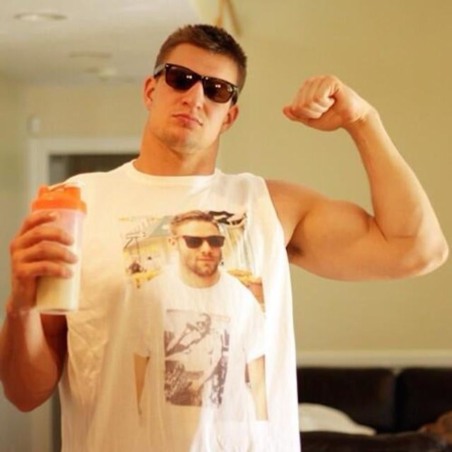 Gronk Wears Shirt Of Julian Edelman Wearing Shirtless-Gronk Shirt