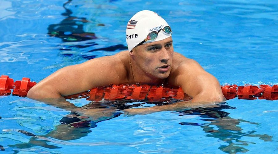 Report: American Swimmers Broke Down Gas Station Door, Fought With Security On Night Of Alleged Robbery