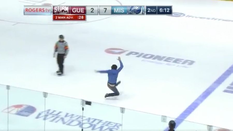 Hockey Idiot On The Field Climbs Onto Ice, Dances Around, Falls On His Ass