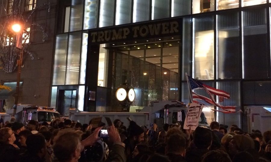 A Crowd Marched Up Manhattan To Yell At A Big Ugly Building<em></em>