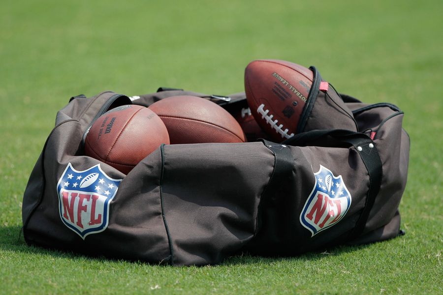 Report: Man (Probably) Took Piss With Two Bags Of Footballs In Tow
