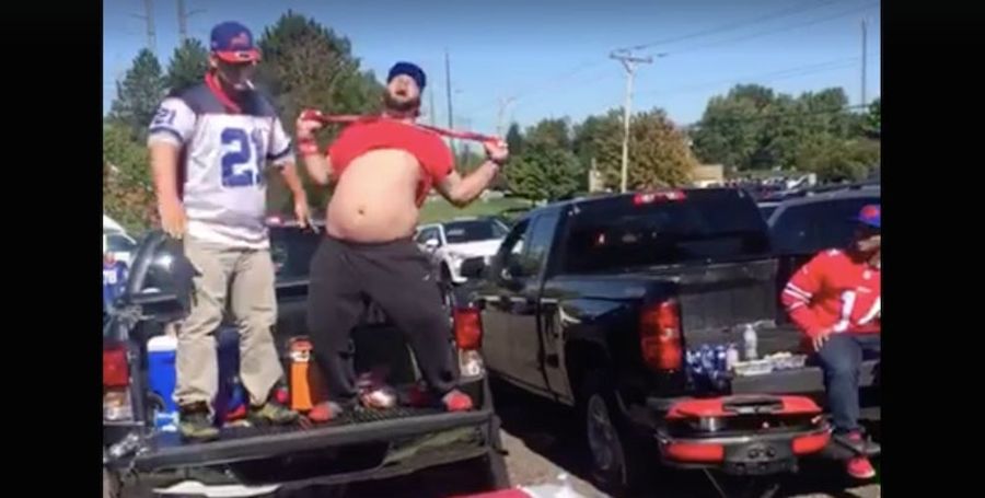 Bills Fans Body-Slam Cardinals Flag Through Table