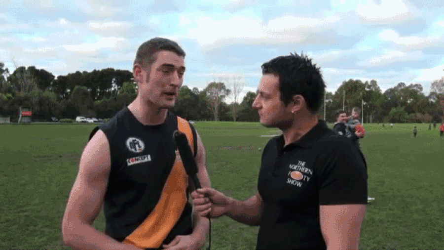 Dad Totally Drops Kid In Background Of Aussie Rules Football Interview