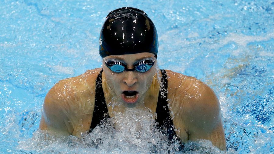 Investigators Search Former Olympic Swimming Coach's Home Following Sexual Abuse Allegations