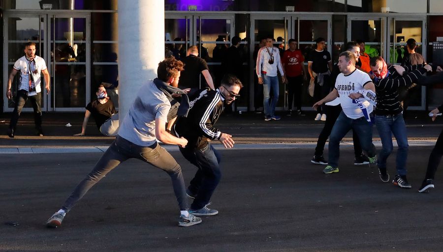 Europa League Match Delayed After Lyon Fans Run Onto Pitch To Escape Fireworks
