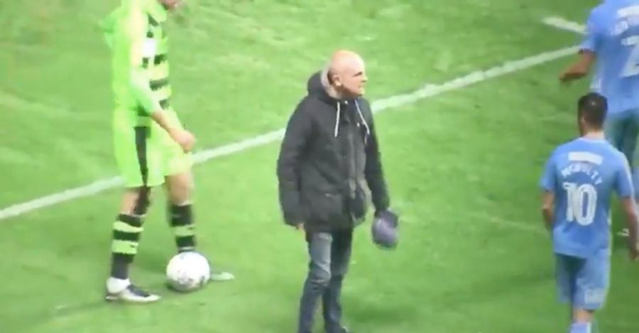 Angry Idiot Sneaks Onto Field To Berate His Team&#39;s Players