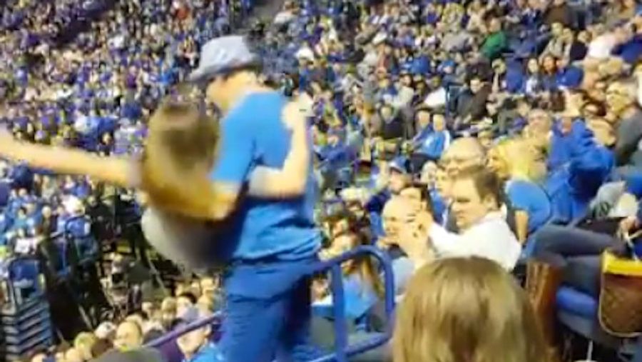 Dancing Kentucky Fan Picks Up Girl, Drops Her Down The Stairs