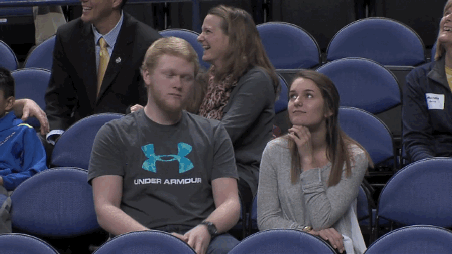 Fan Goes In To Hug Fellow Fan, Dabs Right In Her Face
