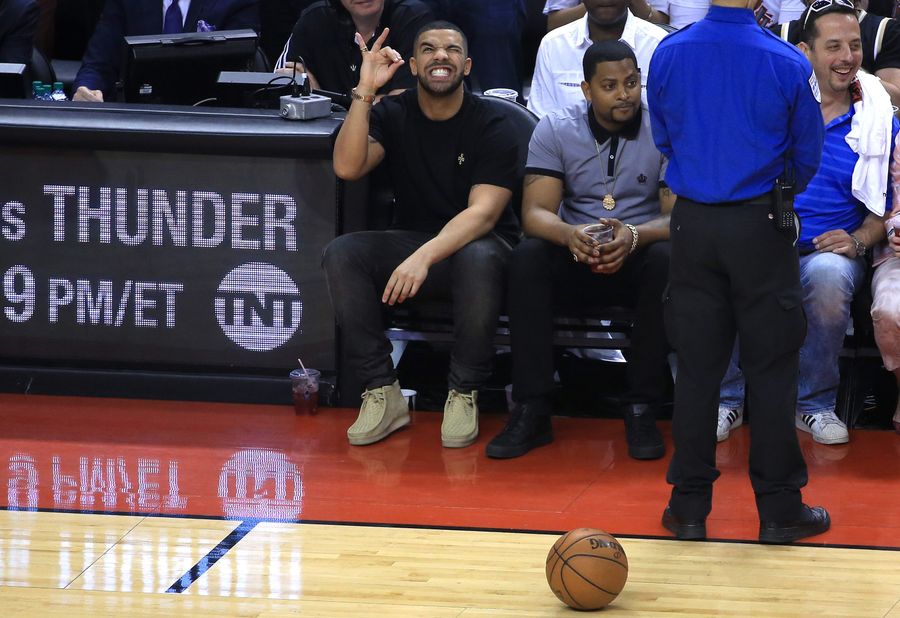 Four Photos Of Drake At The Raptors Game