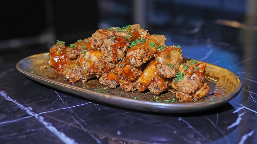 What flavor wings should you eat for the Super Bowl? And why is it honey BBQ?