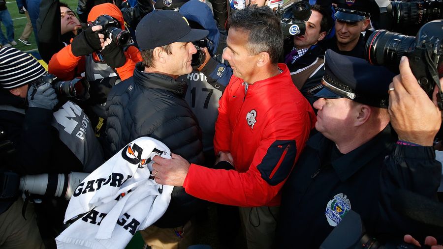 Jim Harbaugh And Urban Meyer Reach Dumb Twitter Milestone With Fake Followers