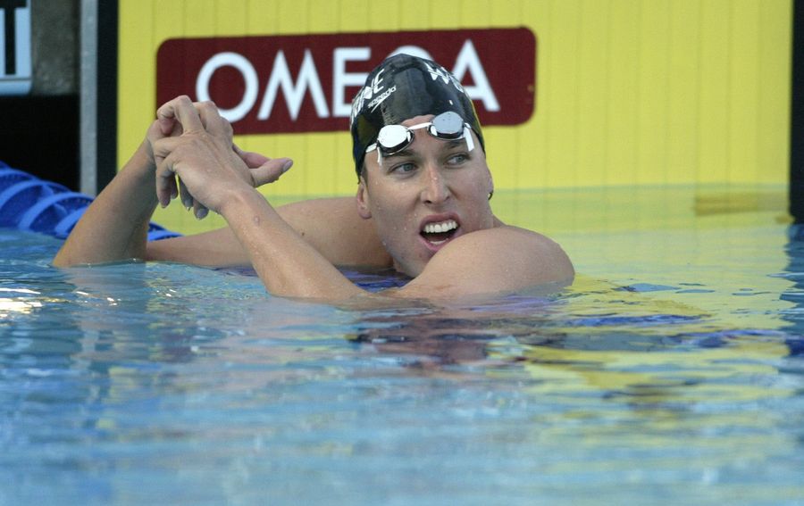 Olympic Champion Swimmer Uses Dogsitter, Comes Home To Find Two Shirtless Guys On Couch With Lube And Camera