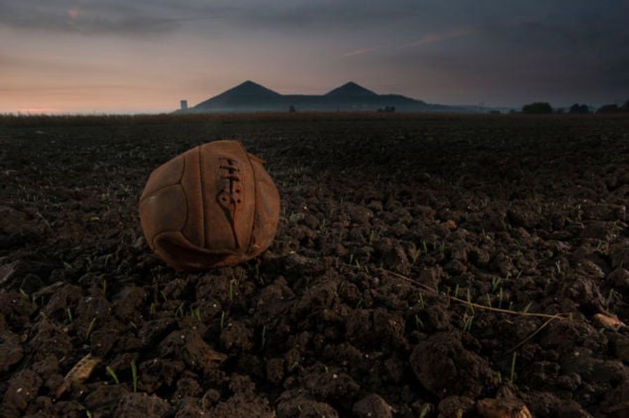 Old Soccer Ball From WWI Battle, Photographed On The Same Field Today